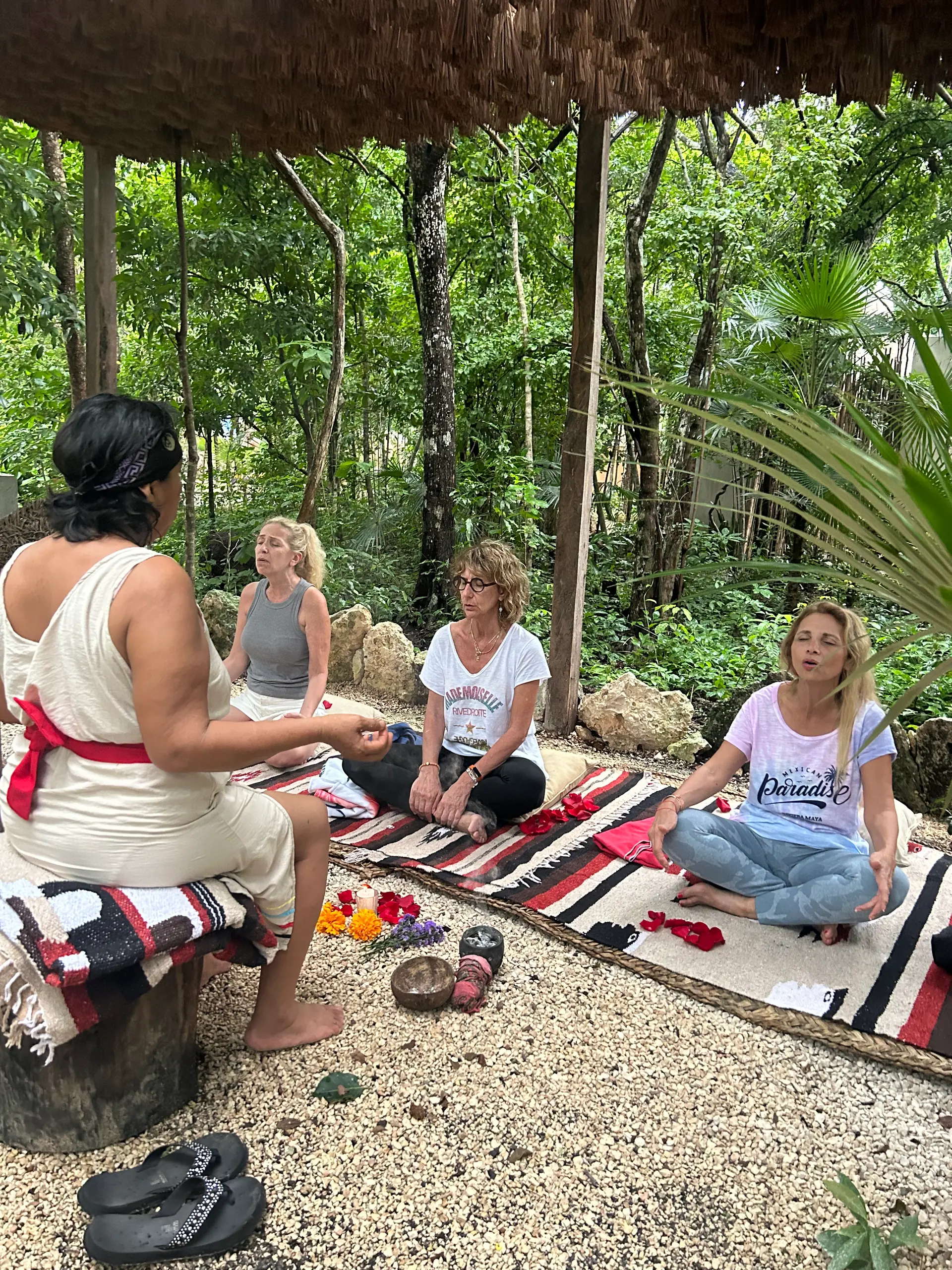 A temazcal in the jungle, surrounded by greenery